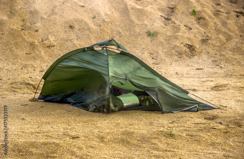 broken tent at the beach