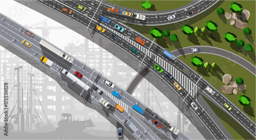 City building under construction and top view expressway with cars