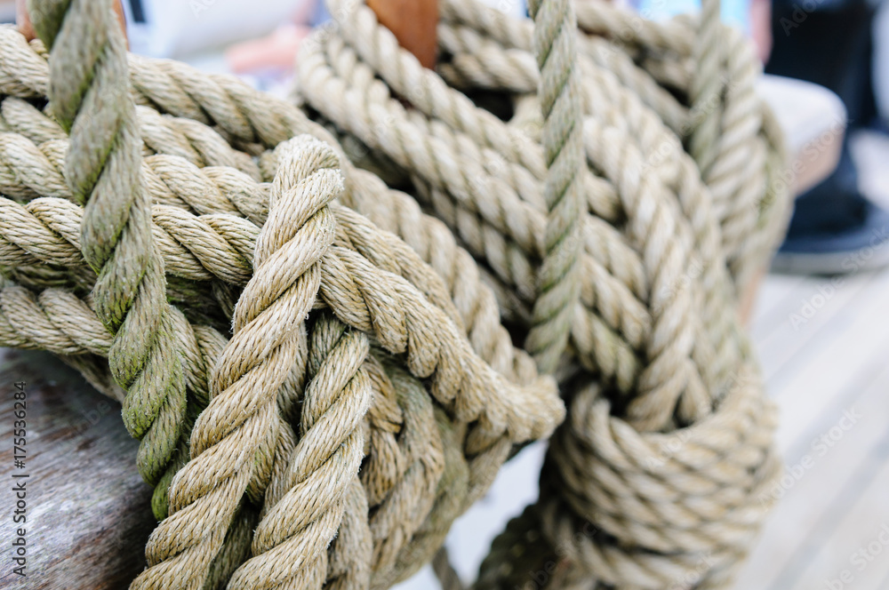 Rope rigging tied up on the deck of a tall ship