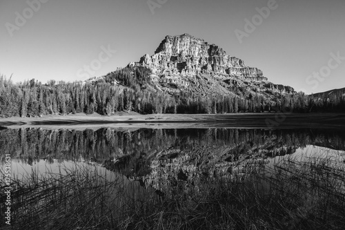 Mountain and reflection in pond in Wyoming wilderness photo