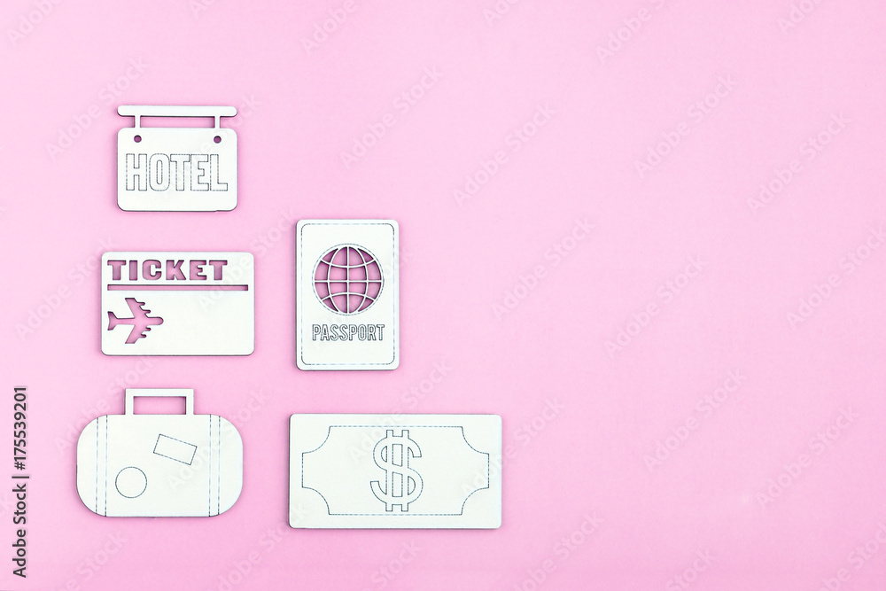 Travel symbols on pink colored background. Copy space Travel symbols on pink colored background. Copy space