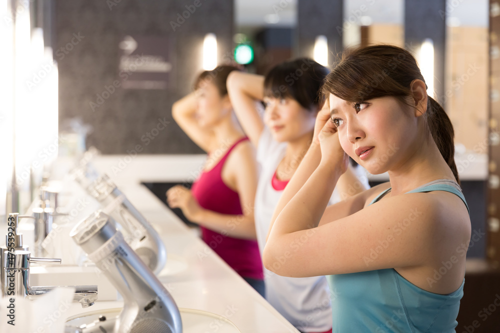 attractive asian women in exercise gym attractive asian women in exercise gym