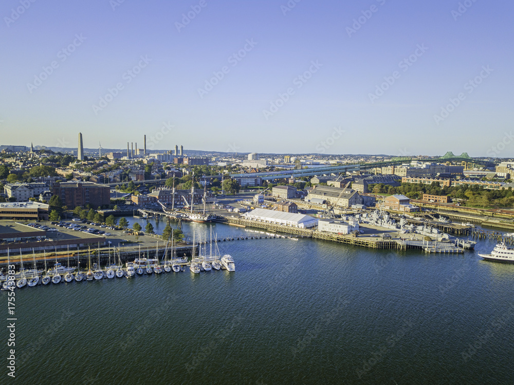 Fototapeta premium Pier of Boston Massachusetts USA, Wharf with sailboat and yachts in Charles Rive, skyline skyscrapers