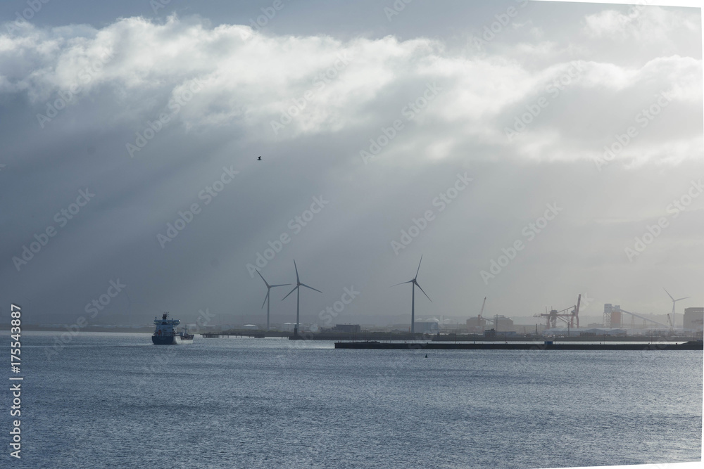freighter and wind turbines