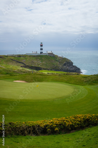 18th green and lighthouse, Old Head Golf Club, Kinsale, County Cork