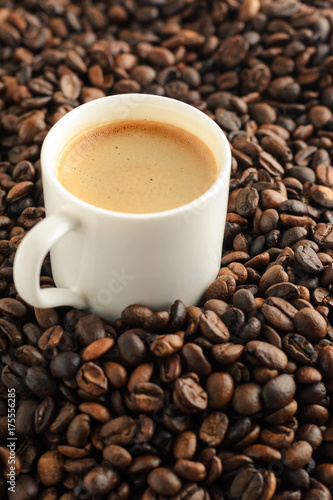 espresso cofee cup on coffee beans background