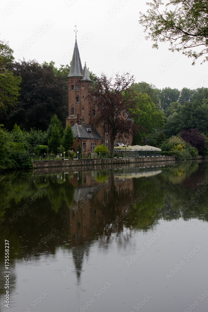 Gothic style building at Lake of Love, Minnewater Park, Bruges Belgium