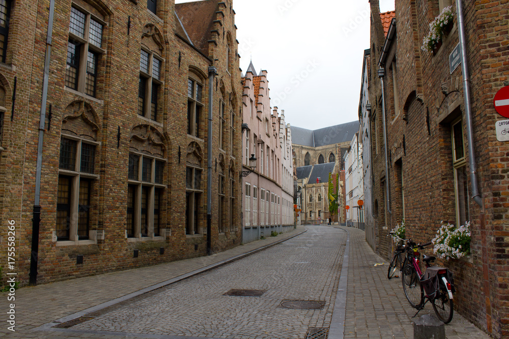 Street along the medieval architecture building in Bruges Belgium