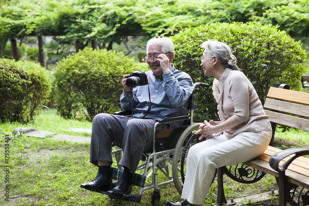An old couple is taking pictures so fun An old couple is taking pictures so fun