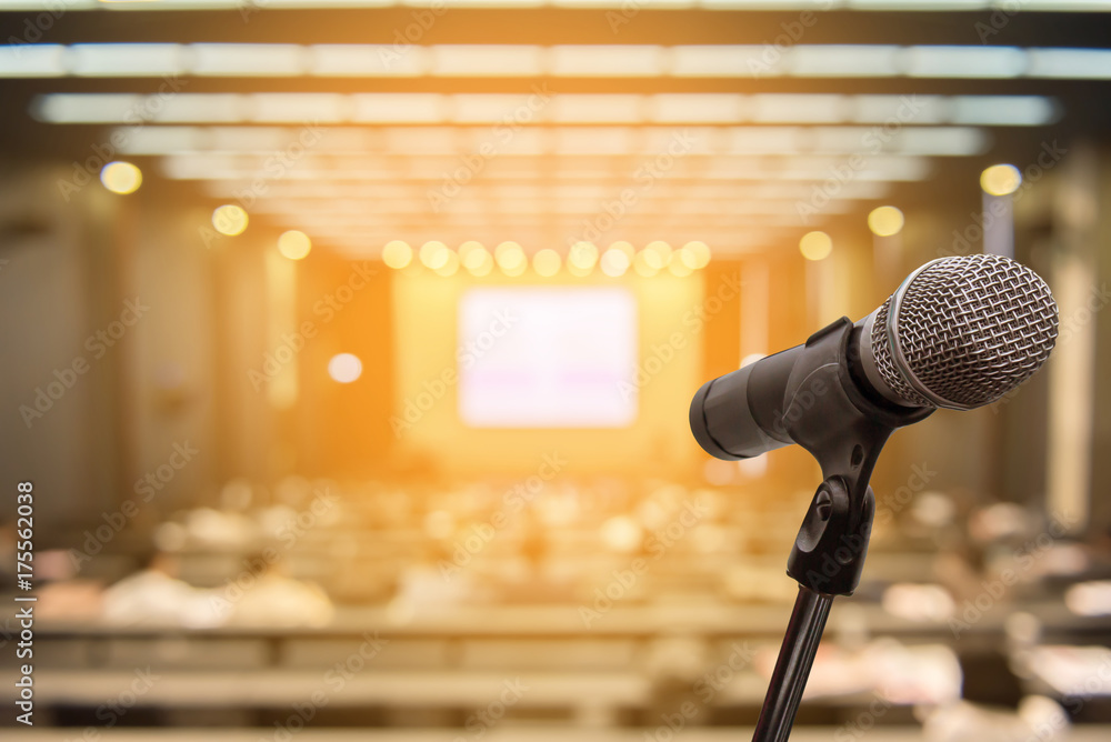 Microphone over the blurred business people forum Meeting Conference Training Learning Coaching Concept, Blurred background