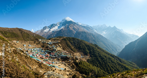 Panoramic view of Namche Bazaar and Thamserku mountain in Solukhumbu district, Nepal photo