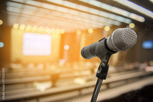 Microphone over the blurred business people forum Meeting Conference Training Learning Coaching Concept, Blurred background