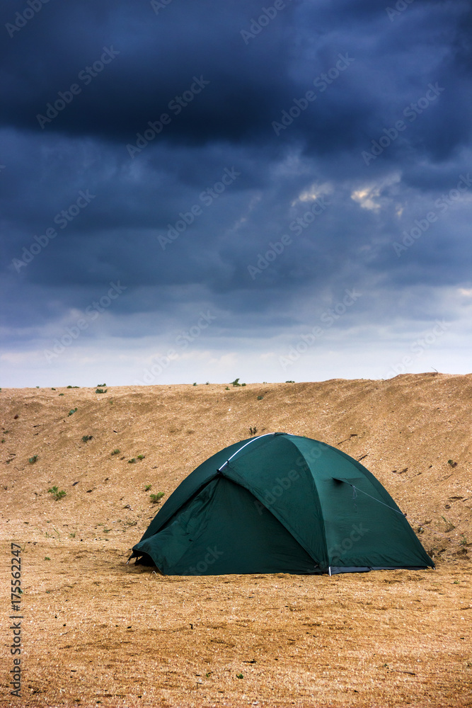 green tent at the beach