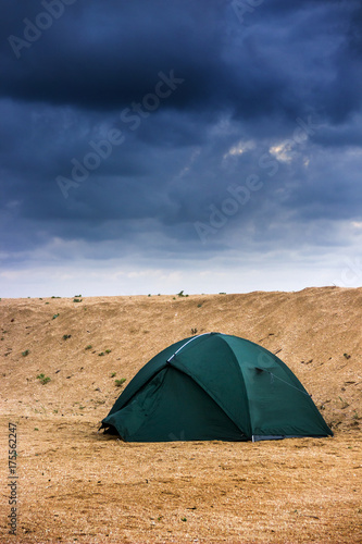 green tent at the beach