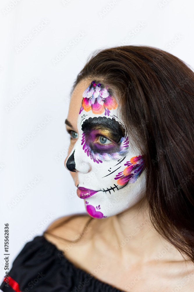Sugar Skull Halloween Makeup. Dia De Los Muertos. Brunette Girl With Mexican  Style Halloween Face Painting. Red Rose, Flower Hair Decor Stock Photo |  Adobe Stock
