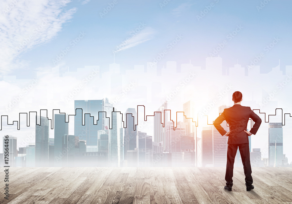Motivation and inspiration concept with modern cityscape and businessman observing it Motivation and inspiration concept with modern cityscape and businessman observing it