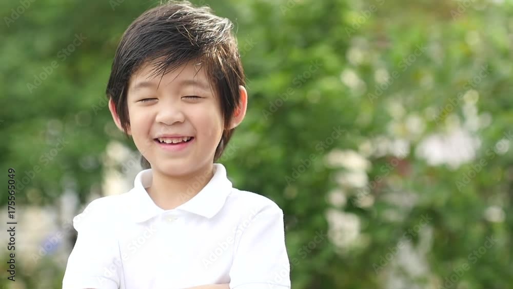 Close up of happy asian child dancing outdoor slow motion Close up of happy asian child dancing outdoor slow motion