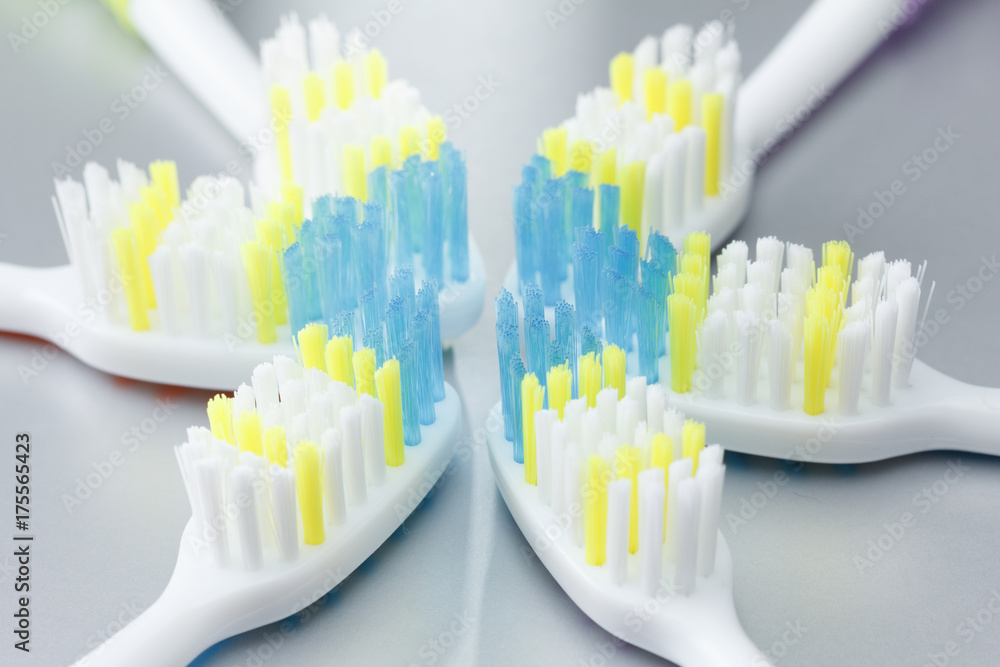 Set of colorful toothbrushes over white