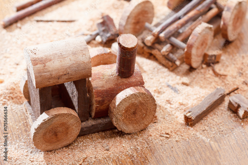 Making a homemade toy made of wood, a children's locomotive train. Creativity and craft. Making a homemade toy made of wood, a children's locomotive train. Creativity and craft.