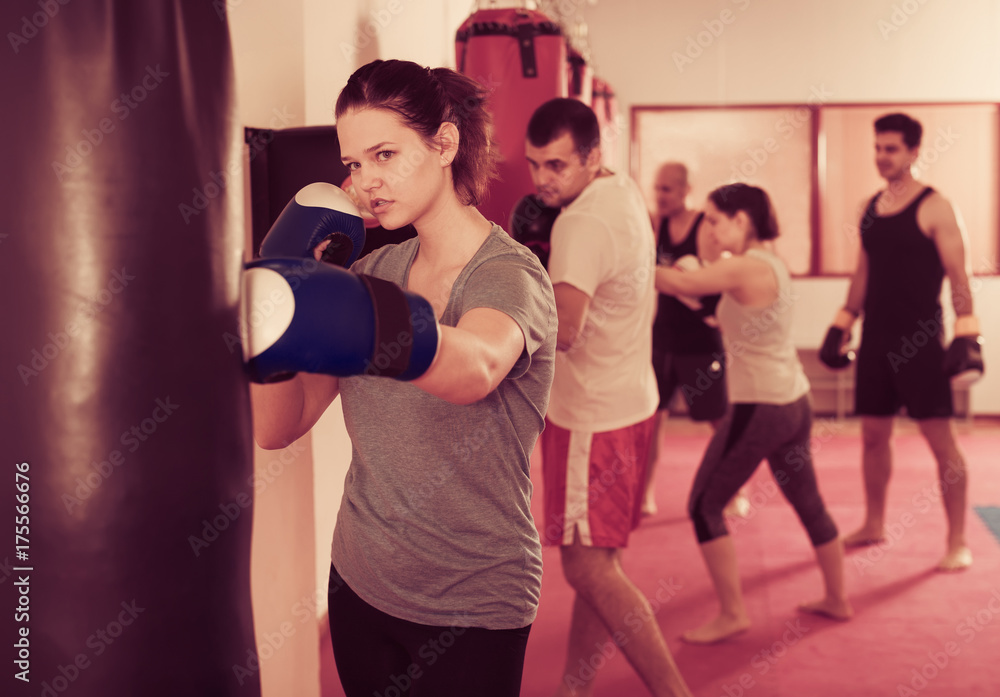 female  in kickboxing  gloves