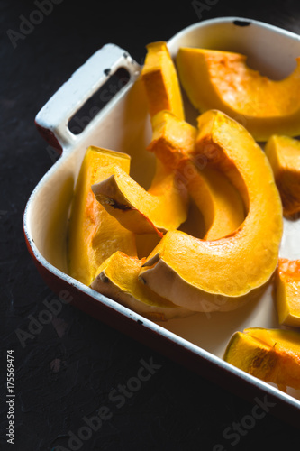 Large pieces of pumpkin in the baking dish free space