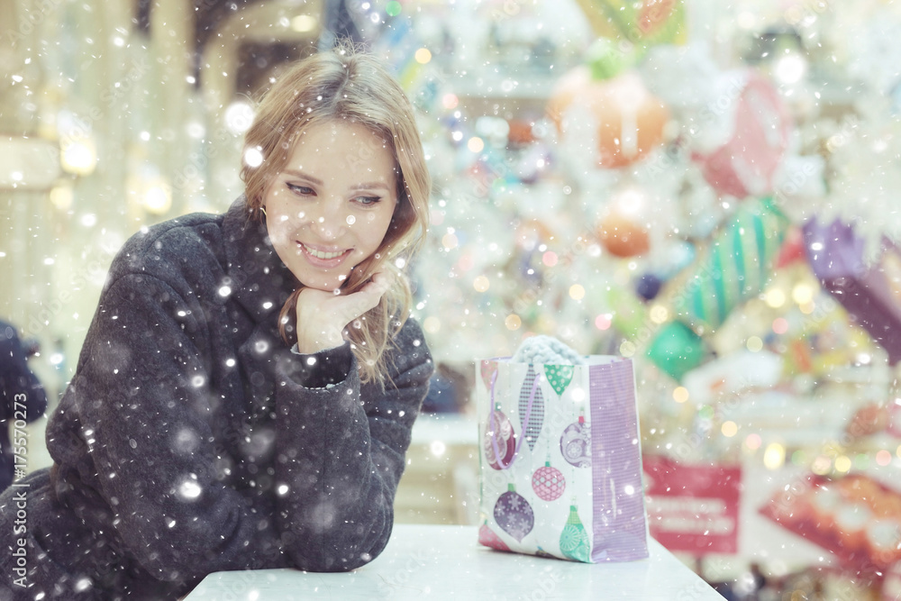 buying Christmas gifts girl snow outside the bag buying Christmas gifts girl snow outside the bag