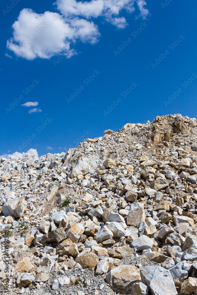 Placer of large stones in a stone quarry close-up. Mining industry.