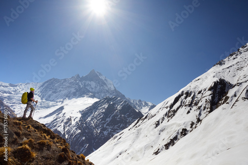 Girl on the background of mountain peaks
