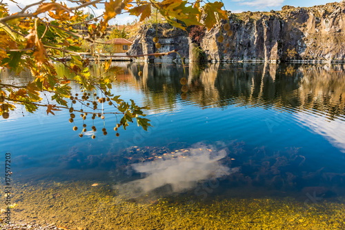 Fototapeta Naklejka Na Ścianę i Meble -  Adala Canyon in Autumn with fall leaves on the trees reflecting in a beautiful pond. Izmir Provnce, Turkey