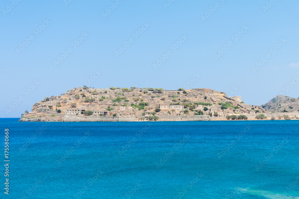 View of the island of Spinalonga (Kalydon) with the abandoned leper colony and the Venetian fortress from the sea