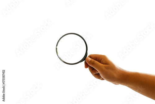 Male hand holding a magnify glass isolated on white background, clipping path. 