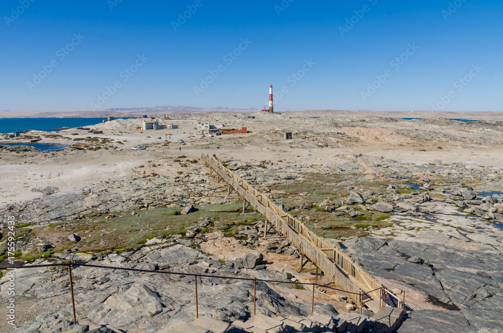 Diaz Point with wooden walkway and lighthouse on the Luderitz Peninsula in the Namib desert, Namibia, Southern Africa