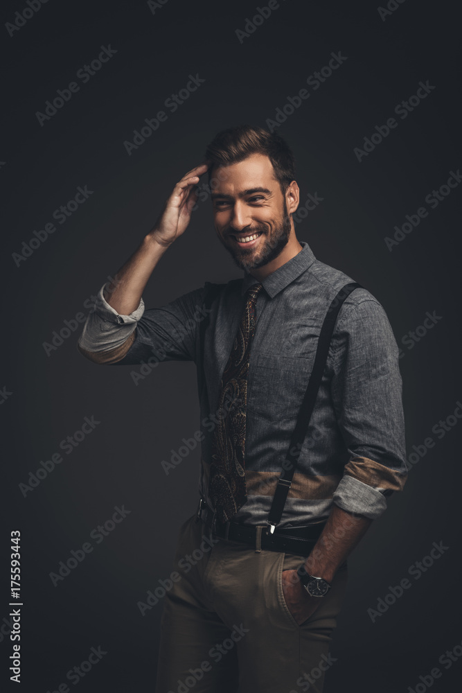 Smiling man in suspenders