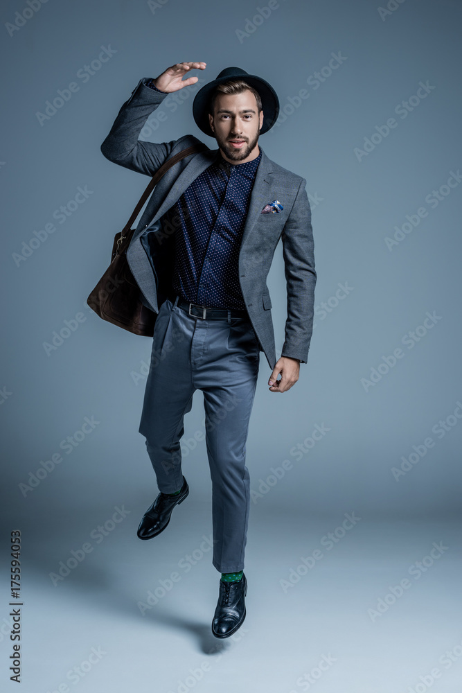 man in suit and hat walking man in suit and hat walking
