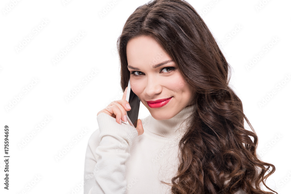 Smiling woman talking on phone Smiling woman talking on phone