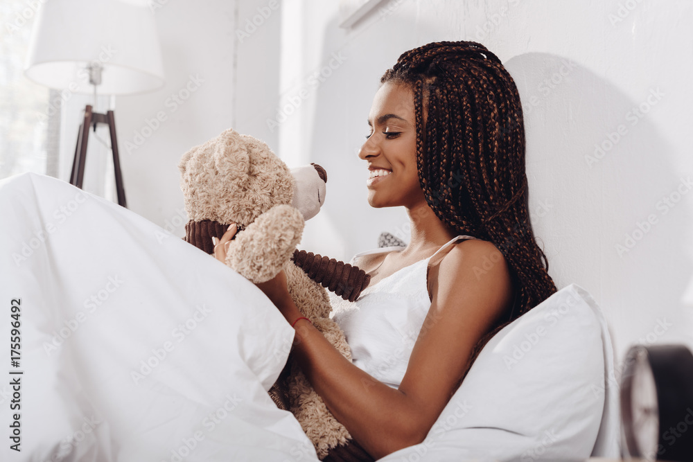 woman with teddy bear in bed woman with teddy bear in bed