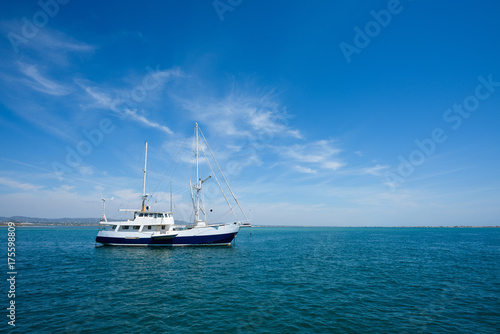 White yacht in the sea at summer day