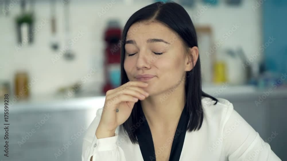 Tired, sleepy businesswoman at home
