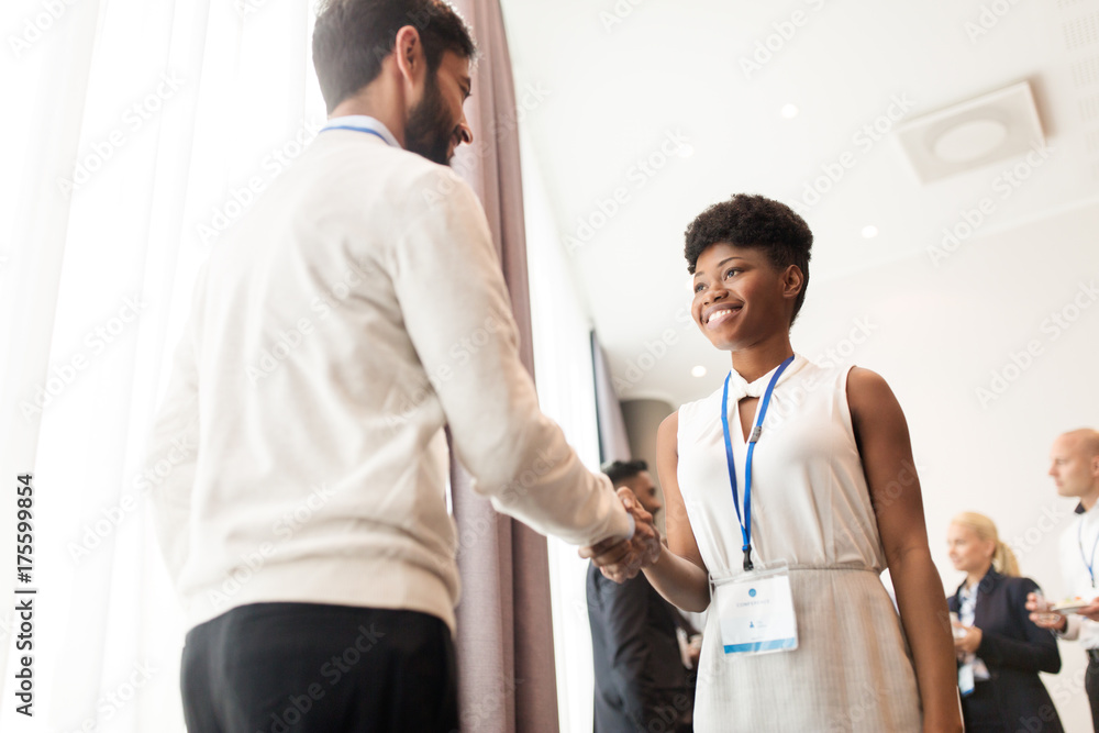 handshake of people at business conference handshake of people at business conference