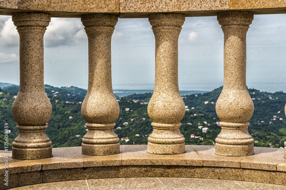 Fototapeta premium Terrace with concrete architectural balusters on a high mountain.