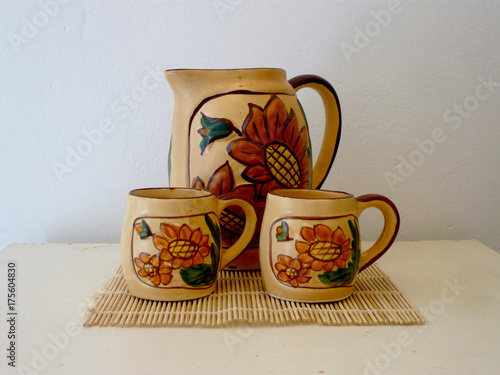 Set of a jug and cups