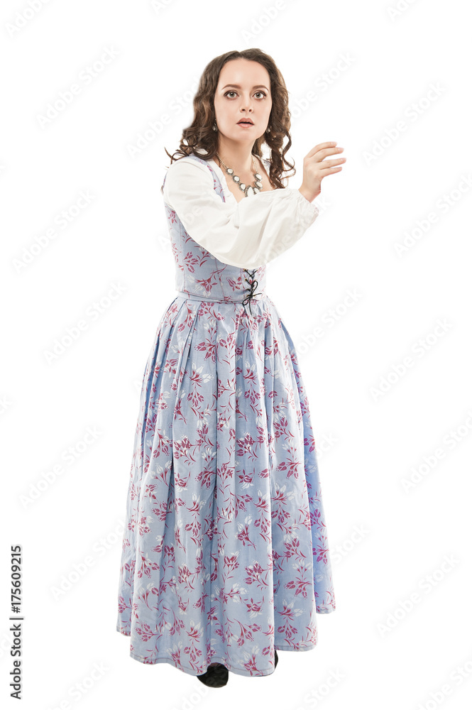 Young beautiful woman in long medieval dress holding something isolated Young beautiful woman in long medieval dress holding something isolated
