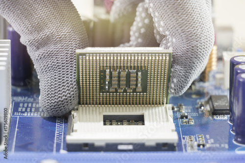 Close up of Electronic CPU on Mainboard computer.