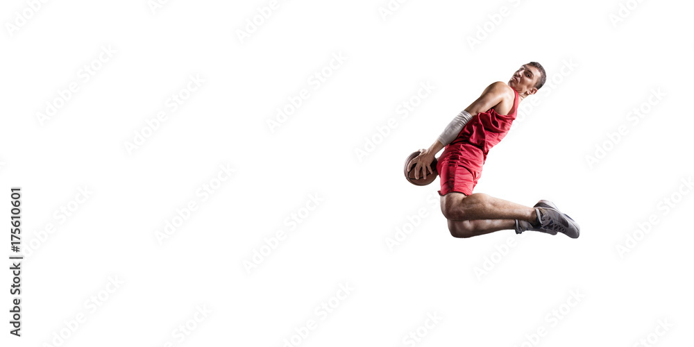 Basketball player makes slam dunk. Isolated basketball player on a white background. Player wears unbranded clothes. Basketball player makes slam dunk. Isolated basketball player on a white background. Player wears unbranded clothes.