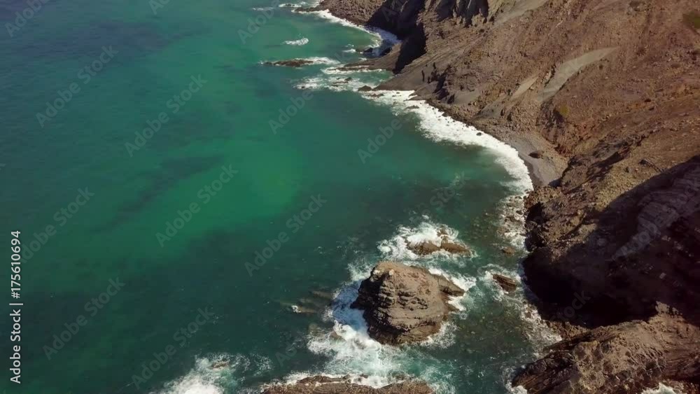 Aerial shot from drone of wonderful view with cliffs and rocks on tropical shoreline of ocean in Algarve, Portugal. Aerial shot from drone of wonderful view with cliffs and rocks on tropical shoreline of ocean in Algarve, Portugal.