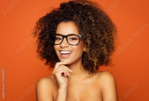 Beautiful black woman wear glasses and smiling photo