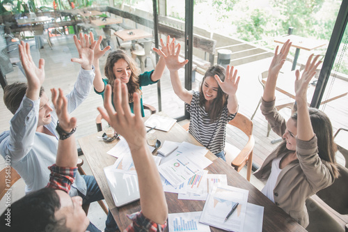 plan business teamwork succeed and put hands up photo