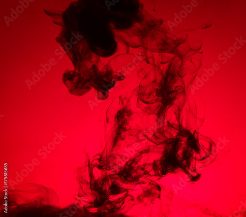 black smoke on red background