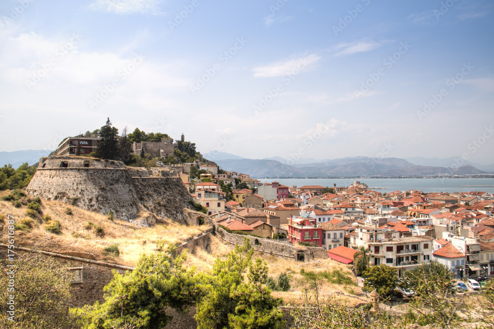 Magnificent view over the old center of Nafplio in Greece taken from Palamidi castle with the sea in the background

