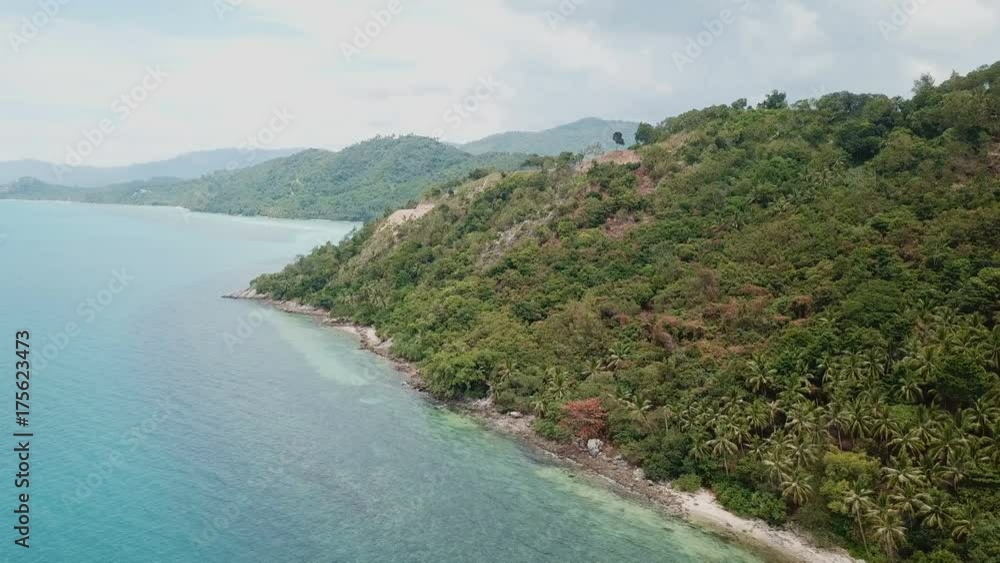 Seashore of Uninhabited Island Overgrown with Trees Seashore of Uninhabited Island Overgrown with Trees